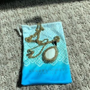 Gold and white Kendra Scott pendant